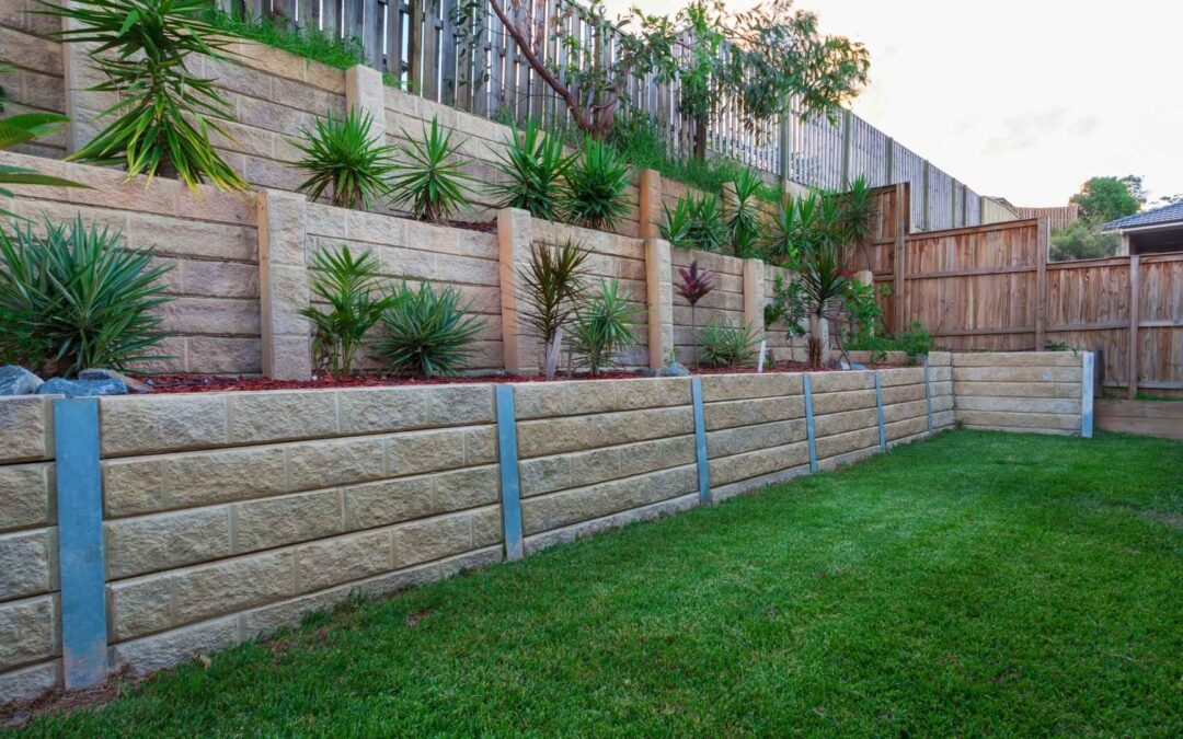 How a Retaining Wall Will Solve Yard Drainage
