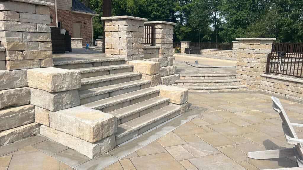 brick and stone staircase leading to patio