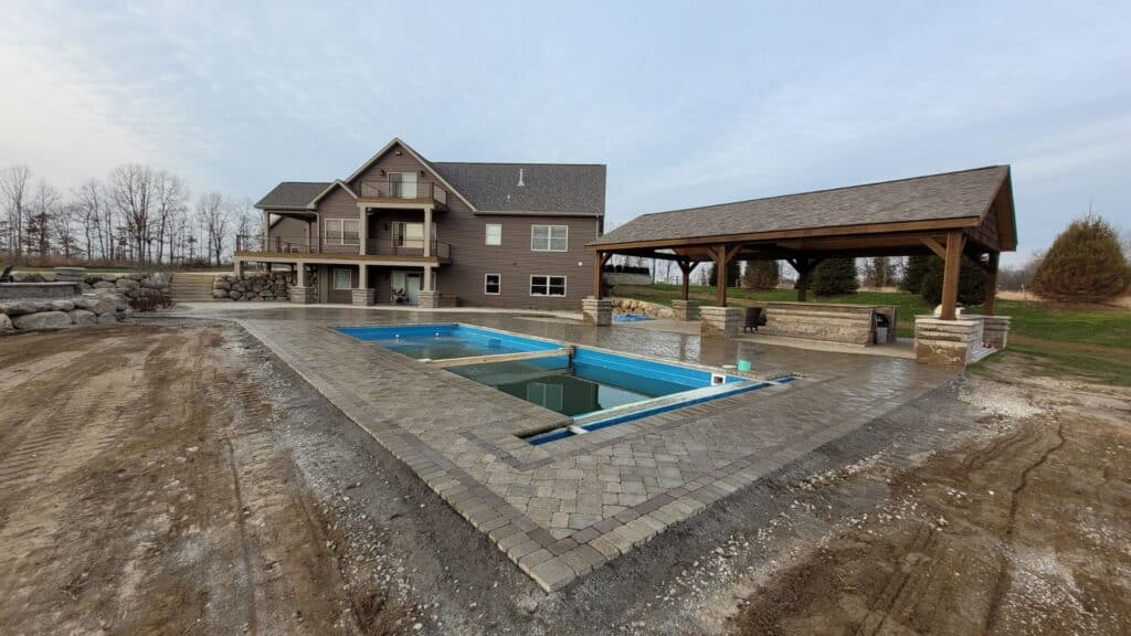 outdoor living space with pool and pergola